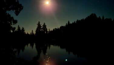 The moon over a lake in the Boundary Waters
